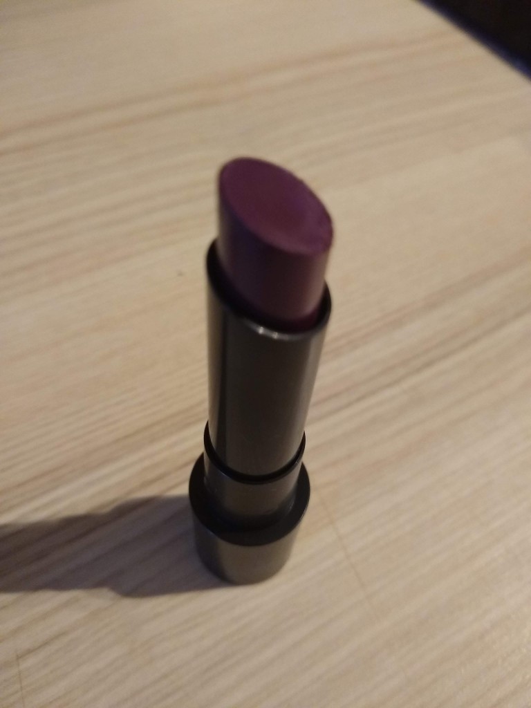 A deep purple lipstick